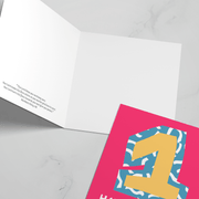 Colorful 1st birthday greeting card with a pink cover and bold number 1, blank inside for personal message.