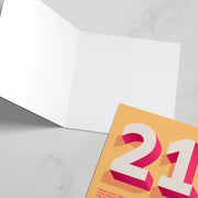 21st birthday greeting card featuring a bible verse, bright orange background, and bold pink numbers.