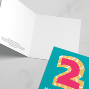 Colorful 2nd birthday greeting card with a bright blue cover and yellow number 2, blank inside.