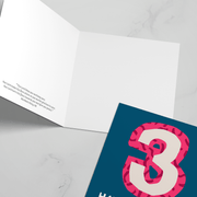 Birthday greeting card featuring a large number '3' in pink and blue, with a blank interior for personal messages.