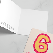 Birthday card featuring a large pink number 6 and a bible verse inside, with a blank interior for a message.