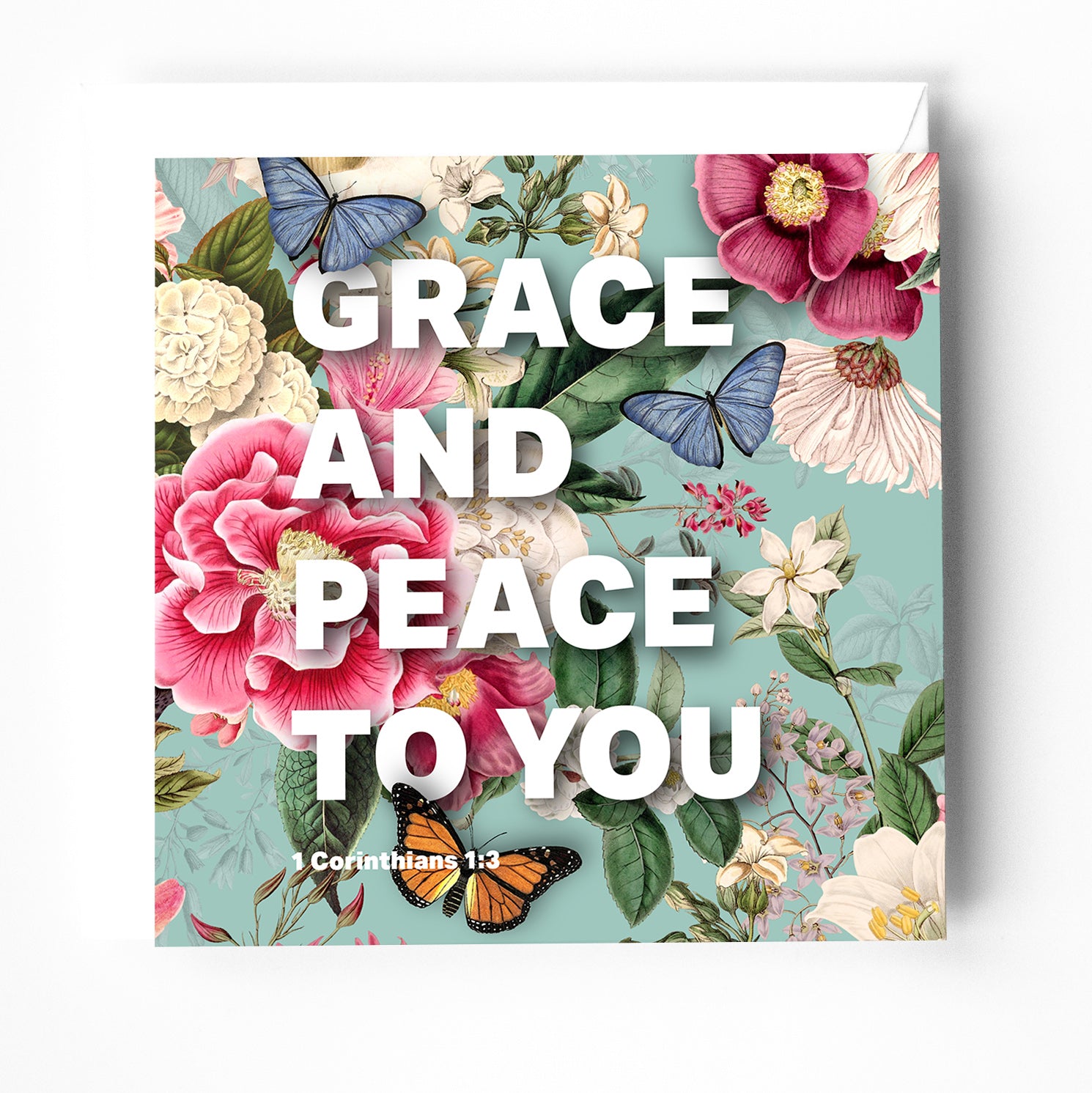 A beautiful modern religious greeting card with the words Grace and Peace to you from the bible. 1 corinthians 1 verse 3. the background is floral. 