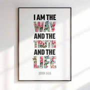 Christian poster featuring the text 'I am the way, and the truth and the life' with floral accents, framed in black.