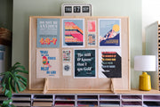 Set of 6 Christian posters and 4 mini prints displayed on a wooden board, featuring various bible verses and quotes.