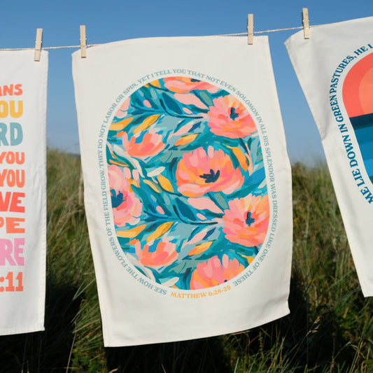 Organic cotton Christian tea towel. Matthew 6. Look at the flowers.