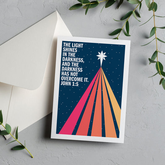 Christian Christmas cards. 'The light shines in the darkness, and the darkness has not overcome it'. John 1 verse 5