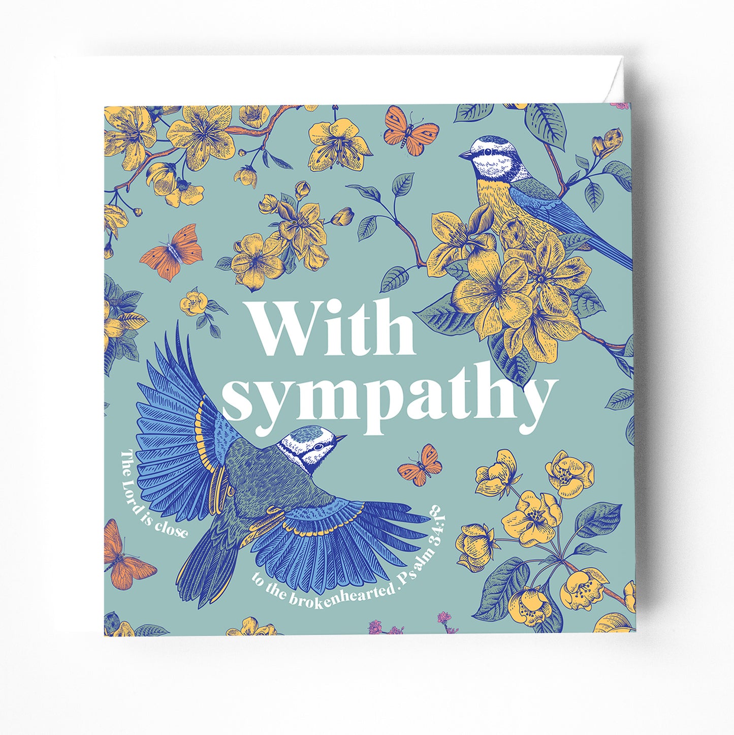 A modern christian with sympathy greeting card. The design has flowers and birds and there is a bible verse on the cover. 