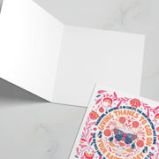 Baptism greeting card featuring a colorful butterfly design and a bible verse inside, with a blank interior.