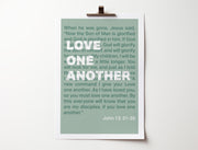 Green poster featuring the text 'Love one another' and a bible verse from John 13:31-35, clipped at the top.