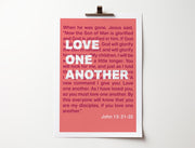 Poster with pink background featuring the text 'Love One Another' and a bible verse from John 13:31-35.