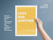 Poster featuring the text 'LOVE ONE ANOTHER' in bold on a yellow background, held by a hand with a white border.
