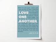 Poster featuring a blue background with the text 'Love One Another' and a bible verse from John 13:31-35.