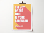 Poster featuring the text 'The Joy of the Lord is Your Strength' in bold white letters on a colorful background.