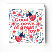 Christmas card featuring angels and flowers with the text 'Good news of great joy' in colorful design.