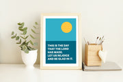Poster featuring a sun and text: 'This is the day that the Lord has made. Let us rejoice and be glad in it.