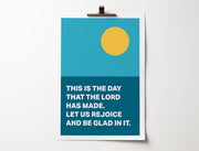 Poster featuring a yellow sun on a blue background with the text: 'This is the day that the Lord has made. Let us rejoice