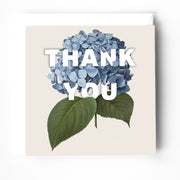 Thank you greeting card featuring a blue hydrangea illustration on a light background, blank inside.