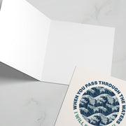 Christian greeting card featuring waves and the text 'WHEN YOU PASS THROUGH THE WATERS' inside.
