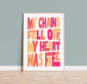Poster featuring bold text in pink, orange, and yellow that reads 'MY CHAINS FELL OFF, MY HEART WAS FREE