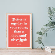 Coral poster with white text reading 'Better is one day in your courts than a thousand' and 'Psalm 84' at the bottom.