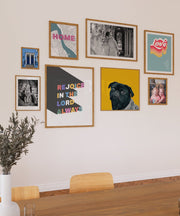 Colorful wall art display featuring the text 'Rejoice in the Lord Always' in bold letters, framed.